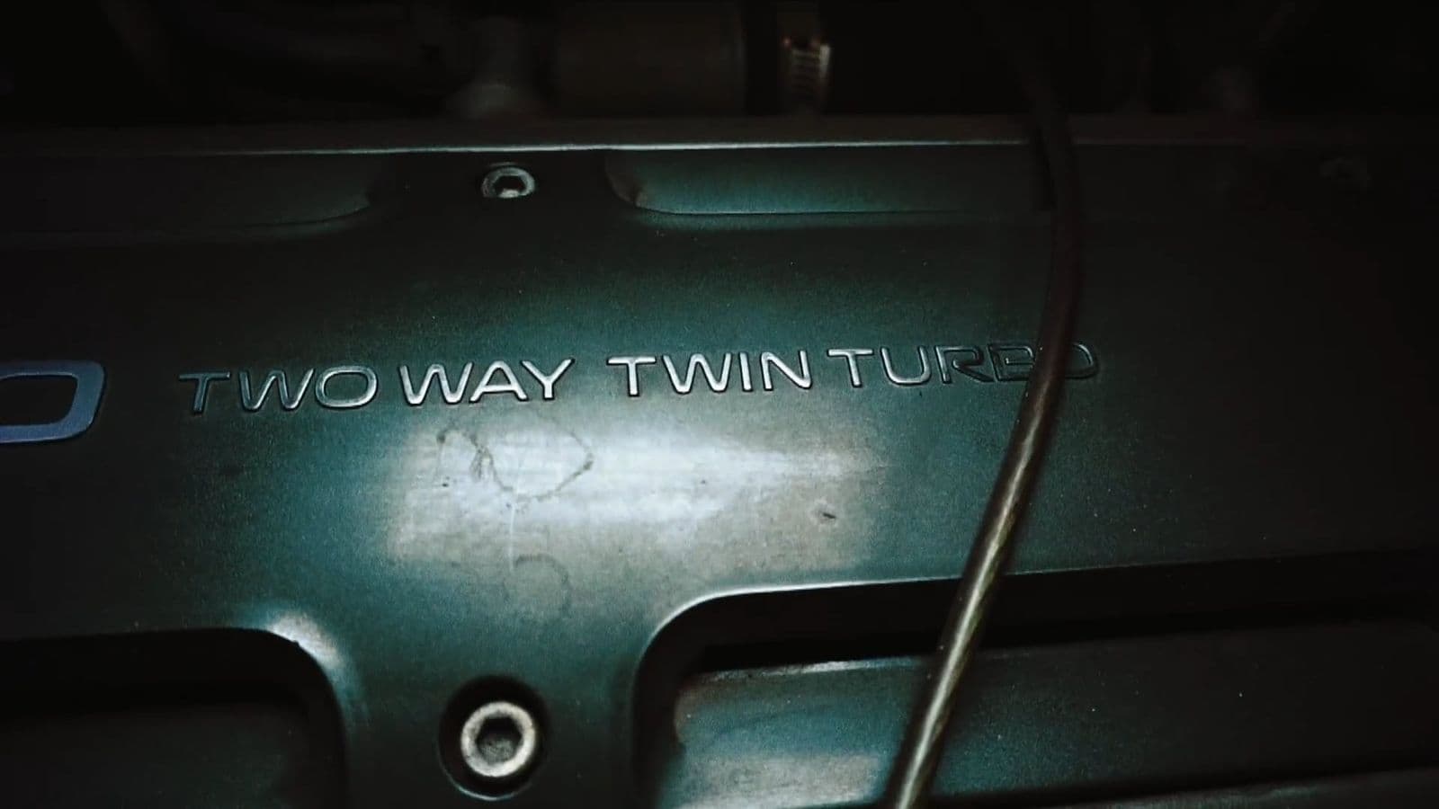 Twin-turbo engine bay lit from one side