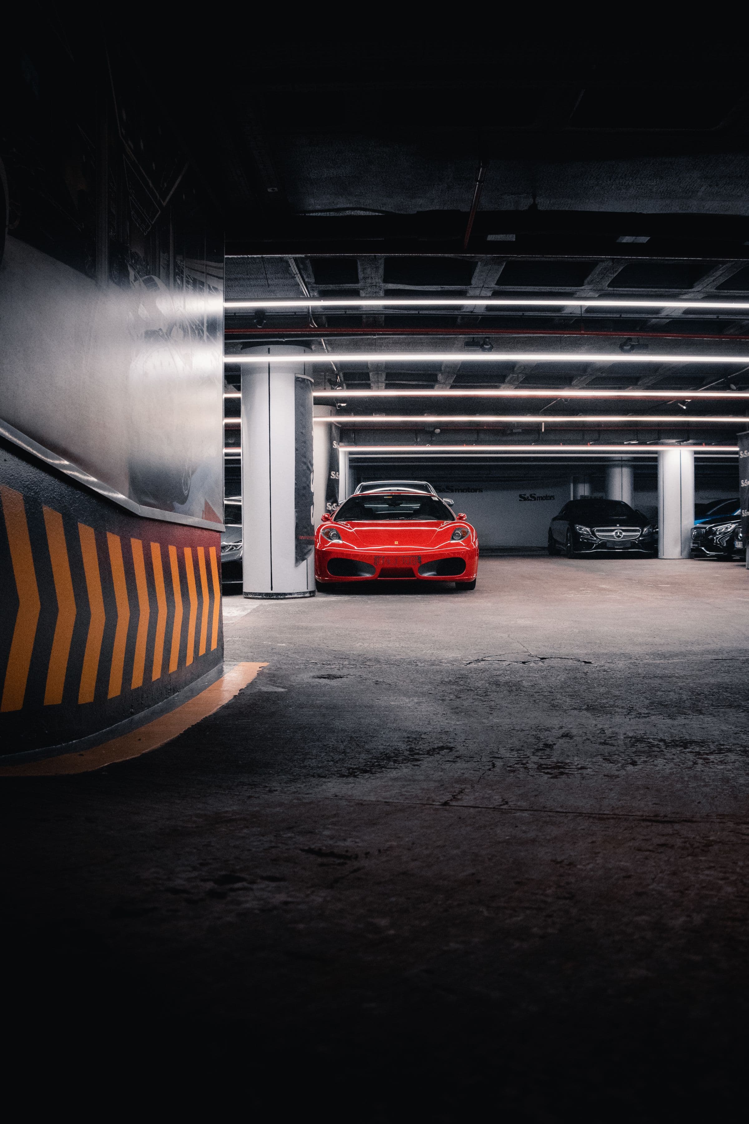 A dark industrial garage with tooling